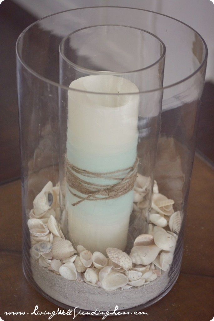 Hurricane lanterns filled with shells and sand make stunning party centerpieces. 