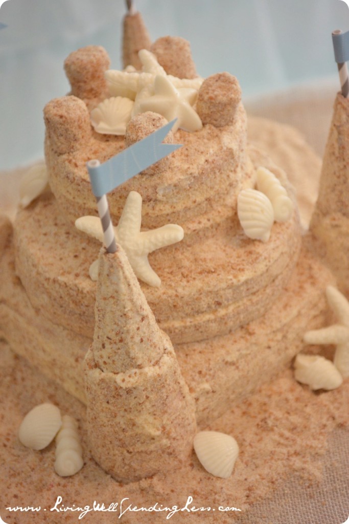 Add white chocolate shells around the sandcastle cake to decorate this beachy treat!