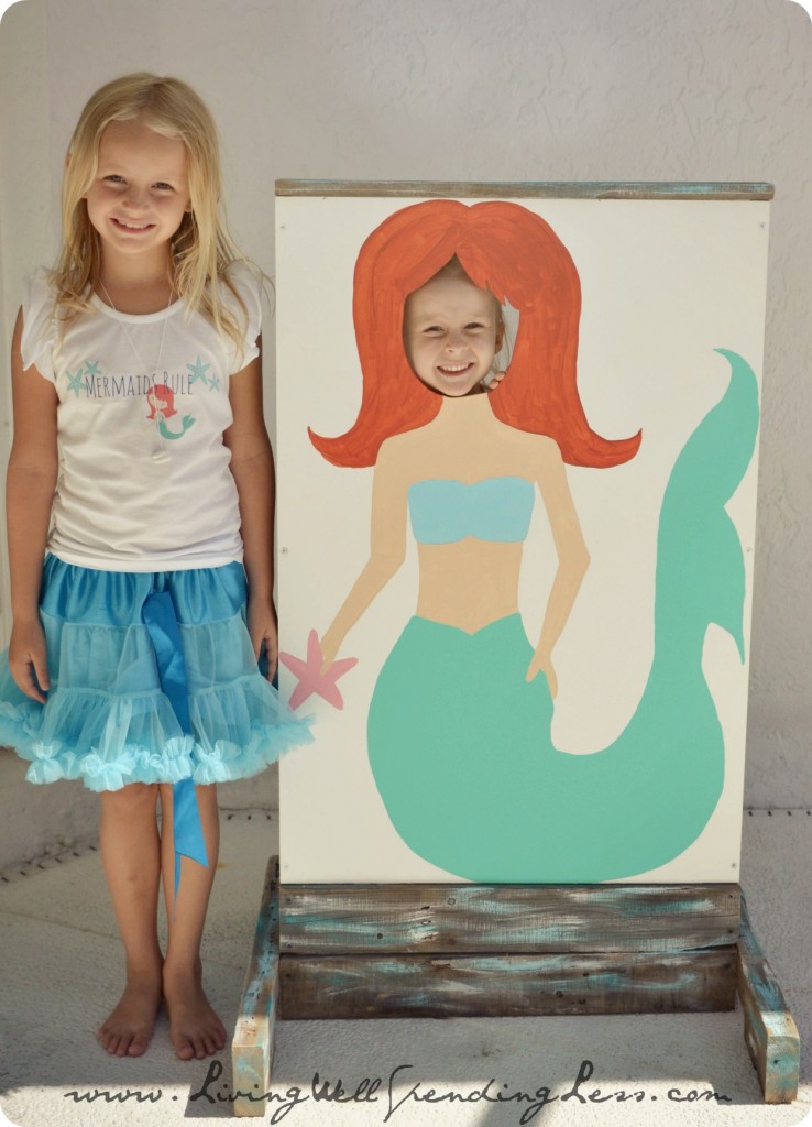 A photobooth, complete with mermaid cutouts is a great addition to the party. 