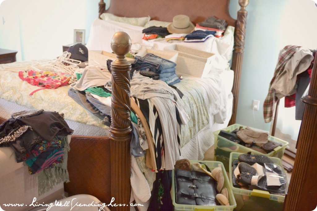 Lay out all your clothing and belongings to organize the bedroom. 