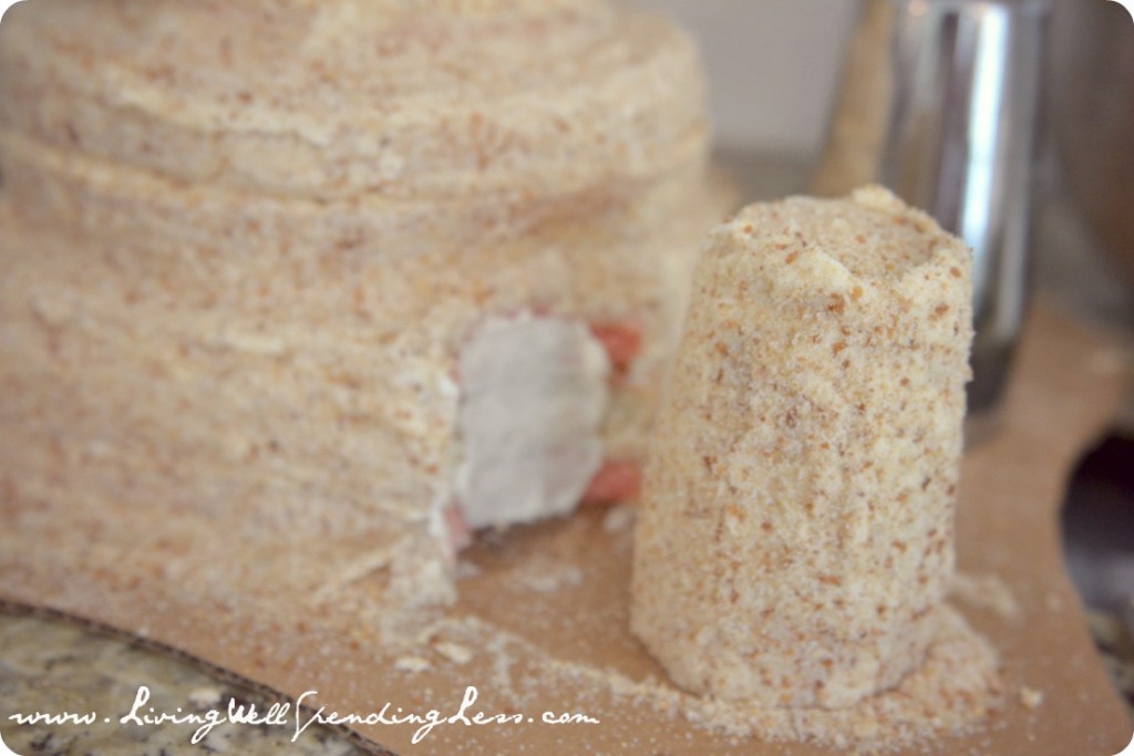 Add the cake towers to your sandcastle cake. 