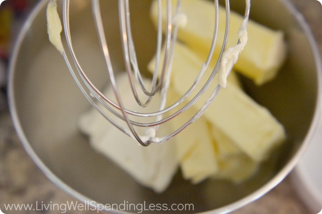 Use your mixer to beat the butter and cream cheese together.