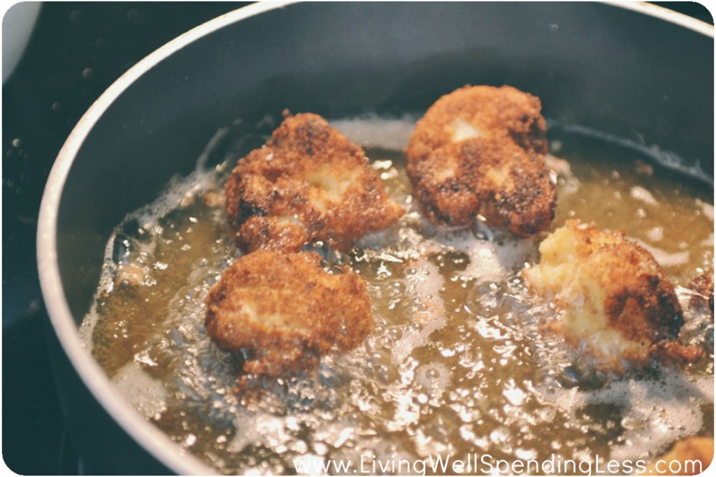 Fry cauliflower in oil for 2-3 minutes per side.