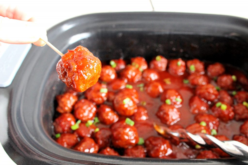 The BEST recipe for Sweet & Sour Crockpot Meatballs! Just 5 ingredients and 5 minutes of time, these meatballs are always the hit of any party or potluck!