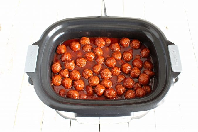 Turn crockpot on low for 6-7 hours or high for 3-4 hours.  (We prefer the low heat longer cooking option!)  Be sure to stir meatballs occasionally, if possible.  