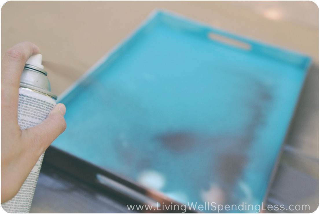 Spray paint can add a whole new life to simple pieces around your house like this serving tray. 