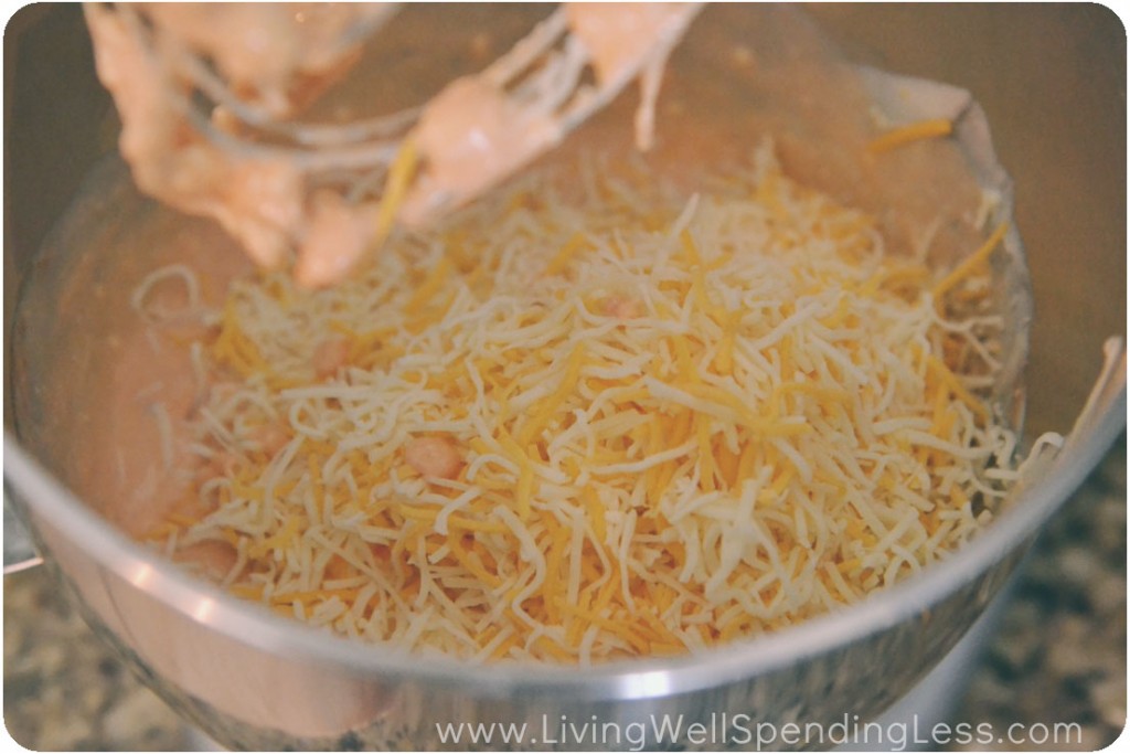 Add shredded cheese to buffalo sauce mixture.