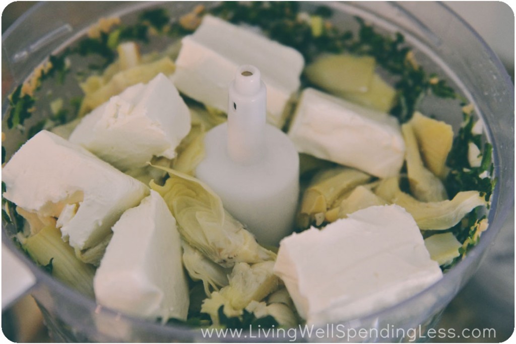 Add in artichokes and cream cheese to food processor