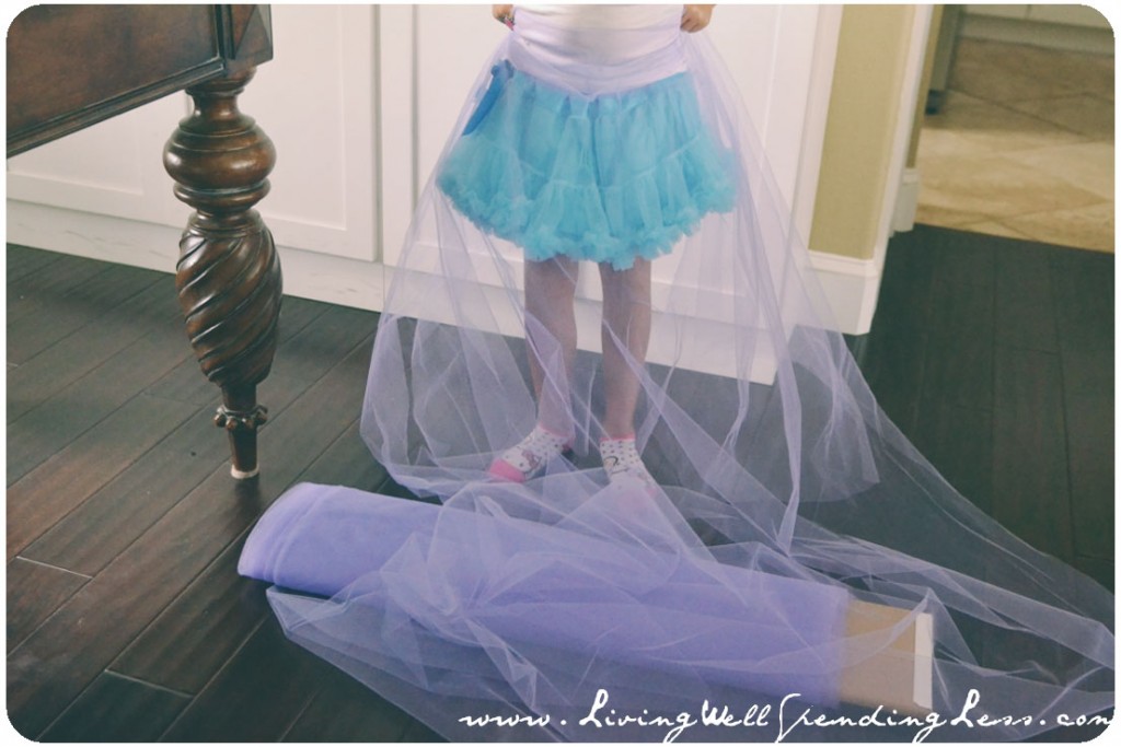 Measuring the tulle for the super full no-sew skirt. 