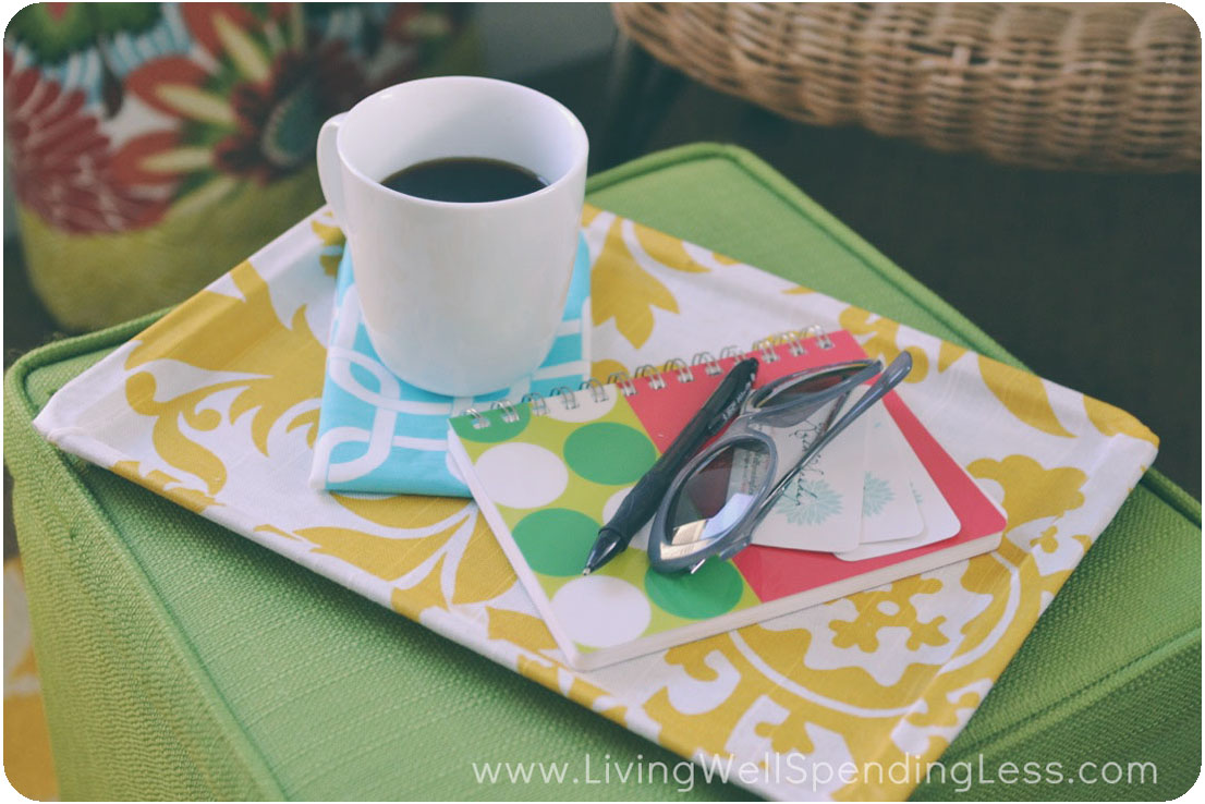 Decoupage can look ultra chic and elegant. This serving tray was covered with fabric, making it a perfect spot to rest coffee and jot down notes in the morning. 