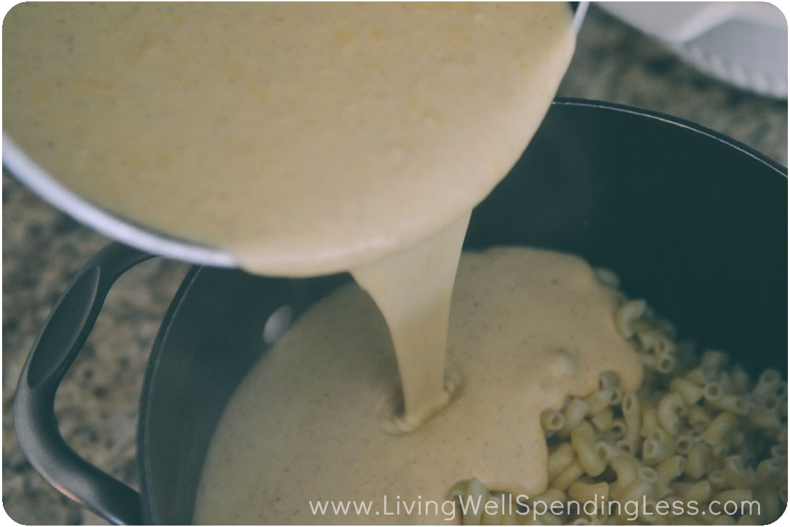 Pour cheese sauce over macaroni noodles. 