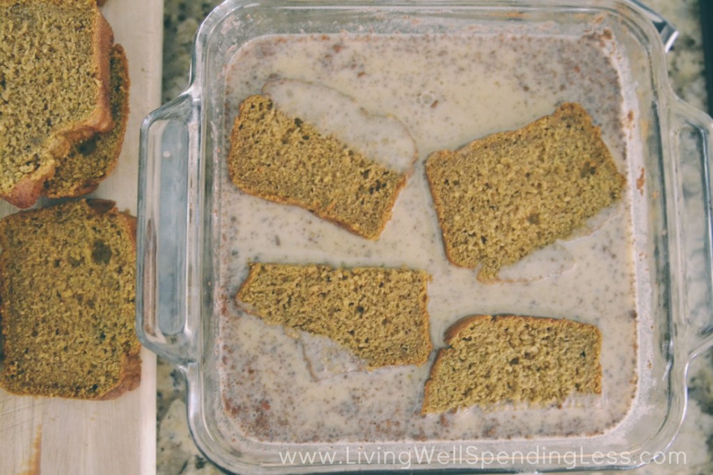 Briefly soak pumpkin bread in egg mixture.