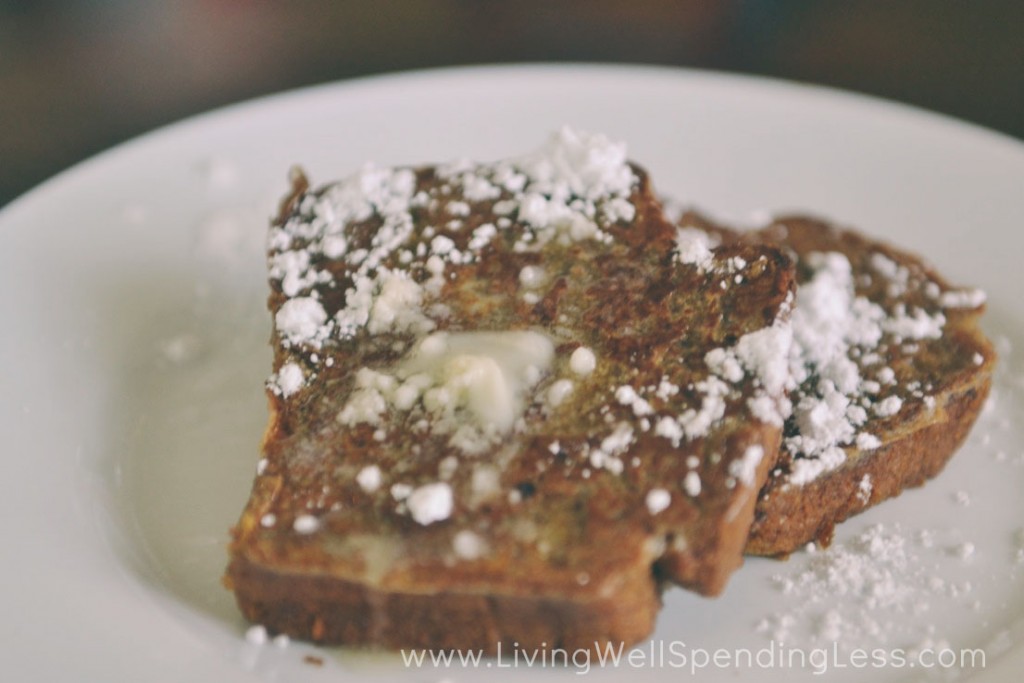 Top pumpkin bread french toast with powdered sugar and serve. 