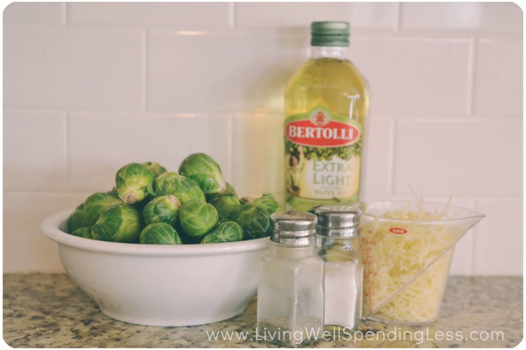 Assemble your ingredients: Brussels sprouts, olive oil, Parmesan cheese and seasoning. 