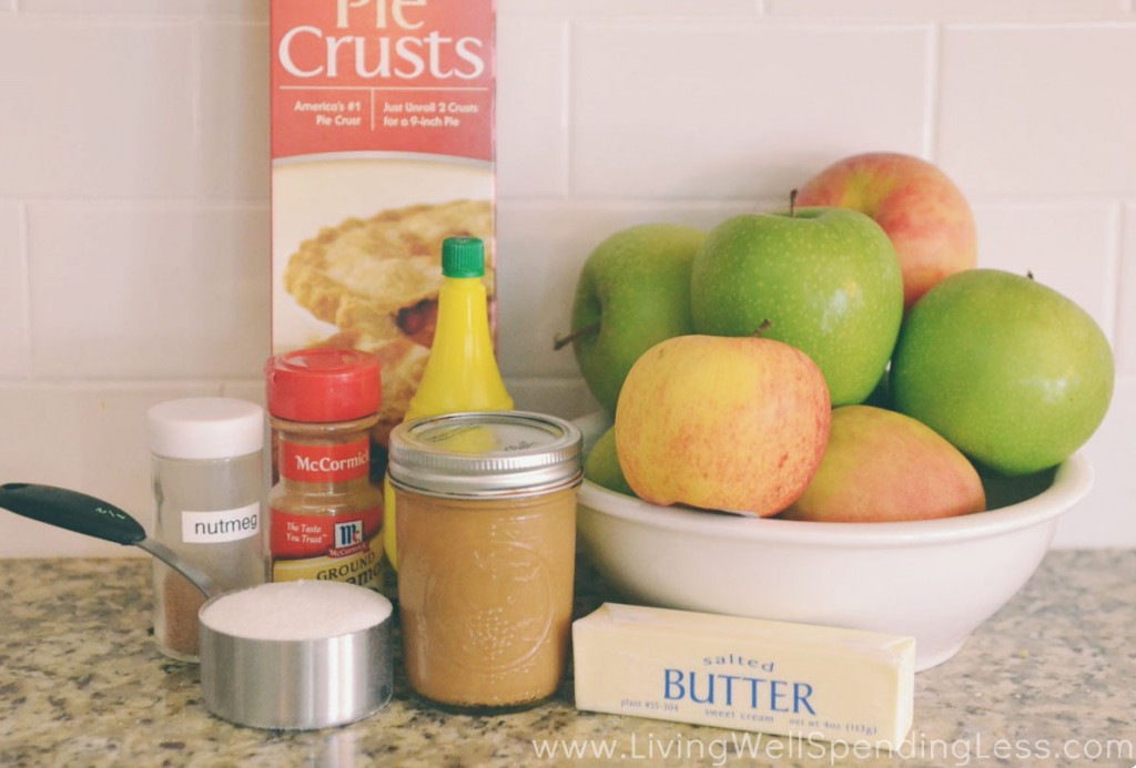 Assemble the ingredients for this yummy caramel apple pie: crust, apples, seasonings, lemon juice, butter and caramel. 