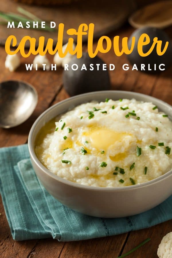 This roasted garlic mashed cauliflower recipe gives you all of the flavor with none of the guilt (and none of the carbs!) Whips up in just minutes! And it's Keto-friendly too! Easy Mashed Cauliflower Recipe | Keto Mashed Cauliflower | Roasted Garlic Mashed Cauliflower Recipe | Easy Roasted Garlic Mashed Cauliflower | Best Roasted Garlic Mashed Cauliflower