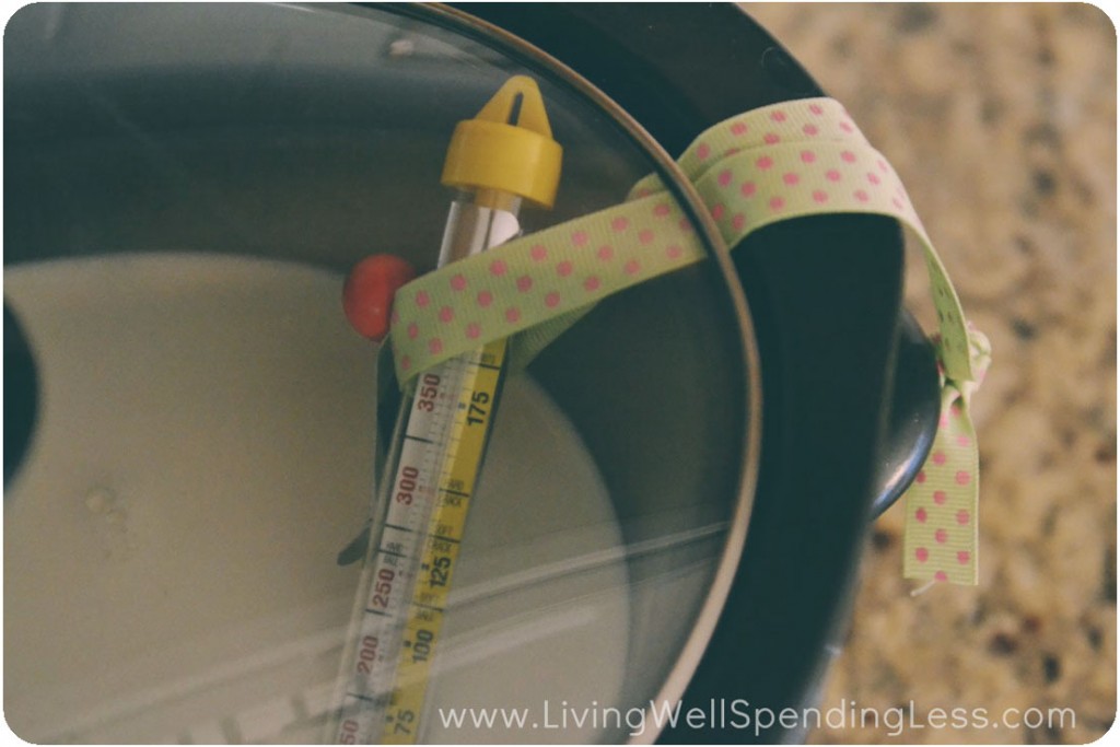 Use a candy thermometer to cool the milk from 1280 to 120 degrees. 