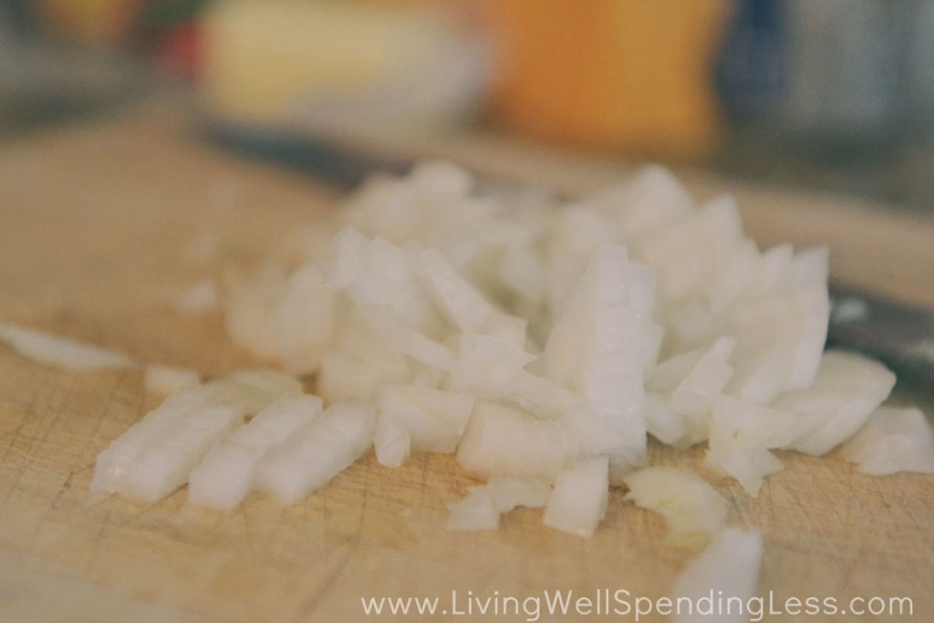 Dice a white onion into small pieces for the goulash.