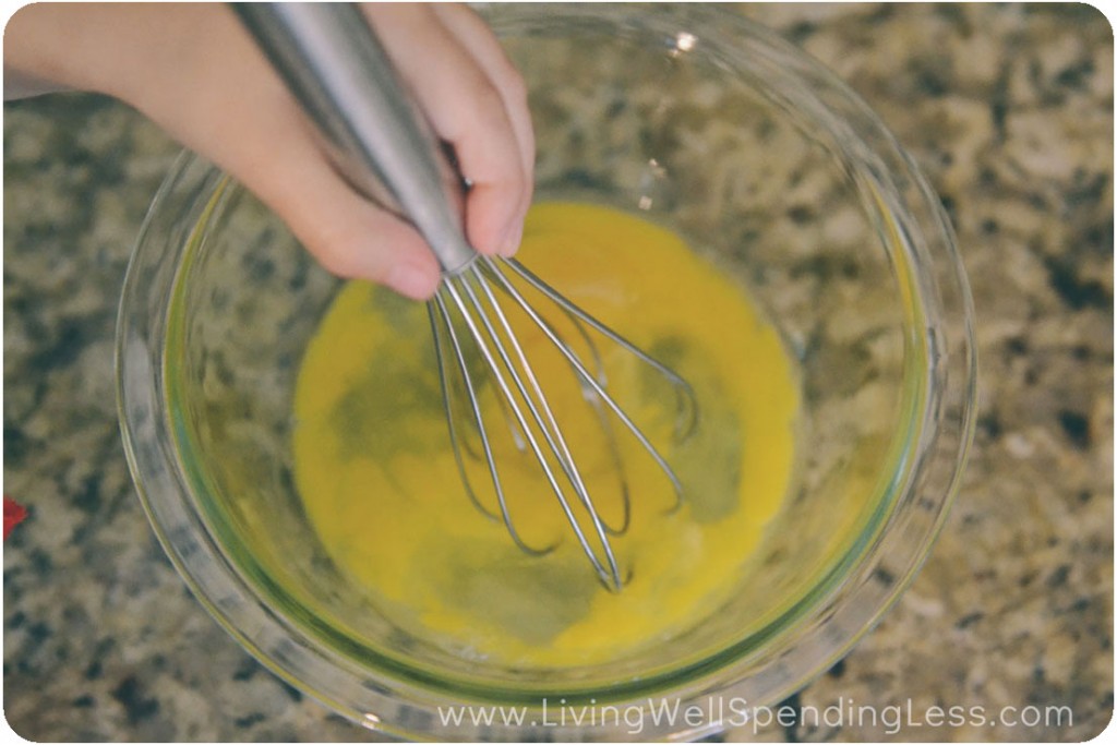 Beat eggs with a whisk.