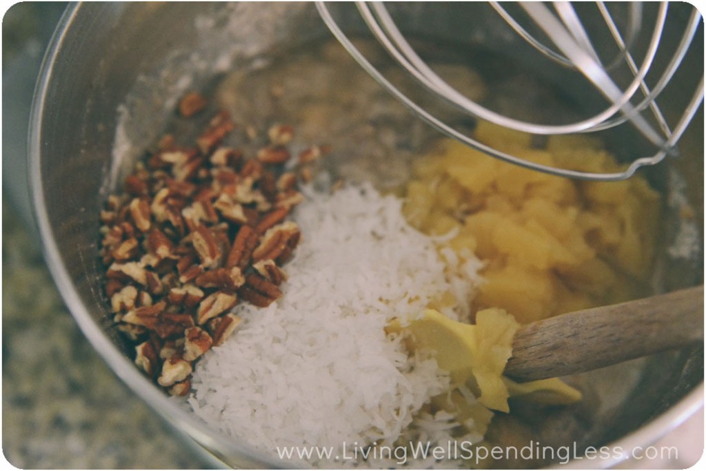 Add bananas, pecans and coconut into mixer.