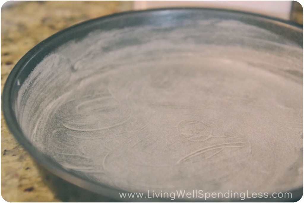 Grease and flour the cake pans.