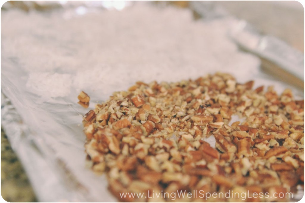 Toast coconut and pecans on a baking sheet.