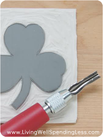 Using a more defined linoleum cutter allows you to get more detail into your design. Work carefully to avoid mistakes.