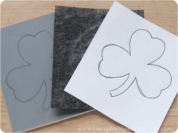 Using a sheet of graphite paper makes copying your stencil on to the linoleum block super easy. 