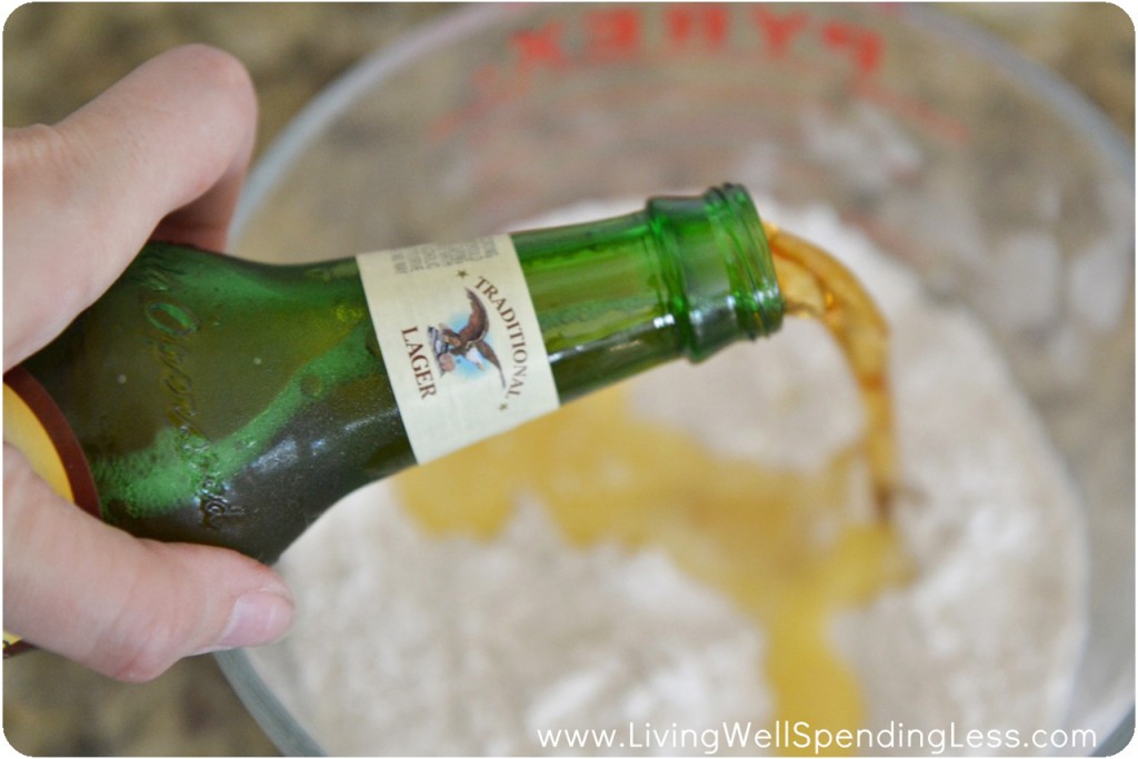 Add the beer and egg to your dry ingredients for this simple beer bread. 