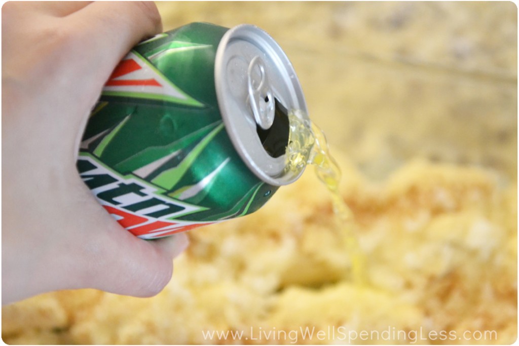 Pour a can of Mtn. Dew soda over the top of the crescent rolls. 