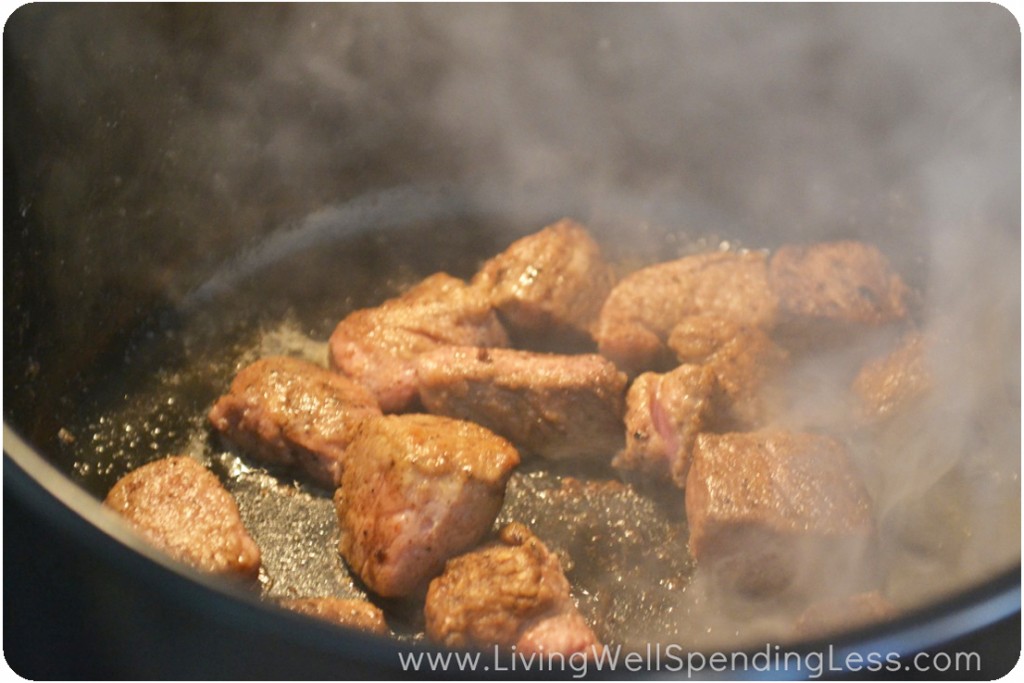 Sear beef chunks on all sides in dutch oven. 