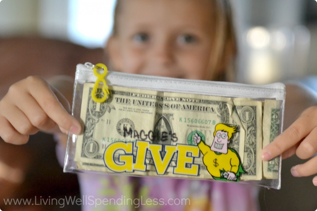 Help kids set aside money to give and place it in a special wallet, like this cute clear giving pouch. 