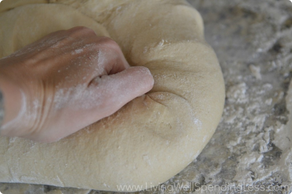 Knead the bread dough on a well-floured surface for 7-10 minutes until the dough is smooth.