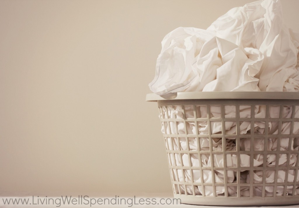 Separate all white fabrics into a single laundry bin together. 