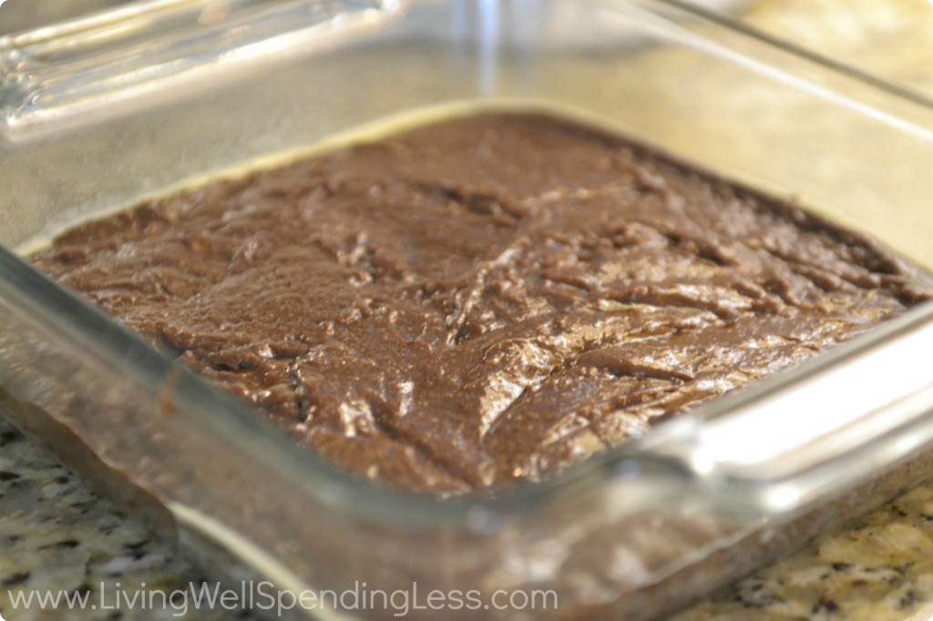 Pour brownie batter into greased 8x8 glass baking dish.