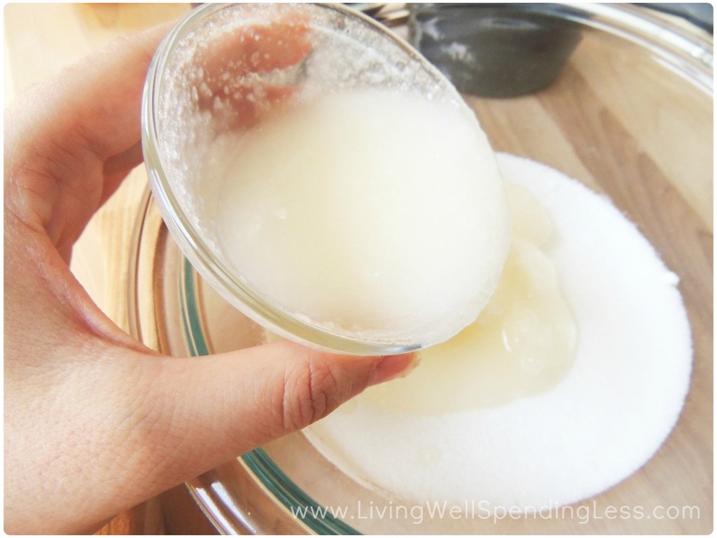Add the oil to the sugar in your mixing bowl to form the base of your sugar scrub. 