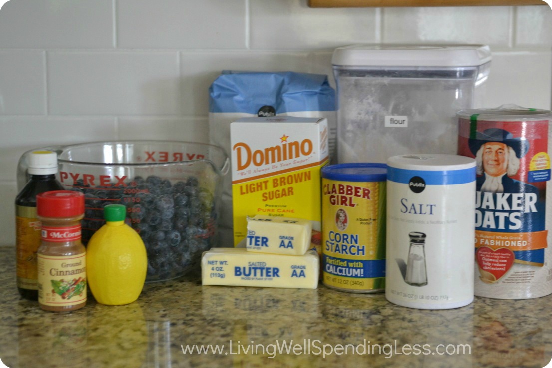 Gather your blueberry crisp ingredients: blueberries, oats, flour, sugar, butter, starch and spices.