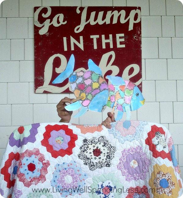 Set up an effortless puppet stage by throwing a blanket over two chairs and begin the rainbow fish show. 