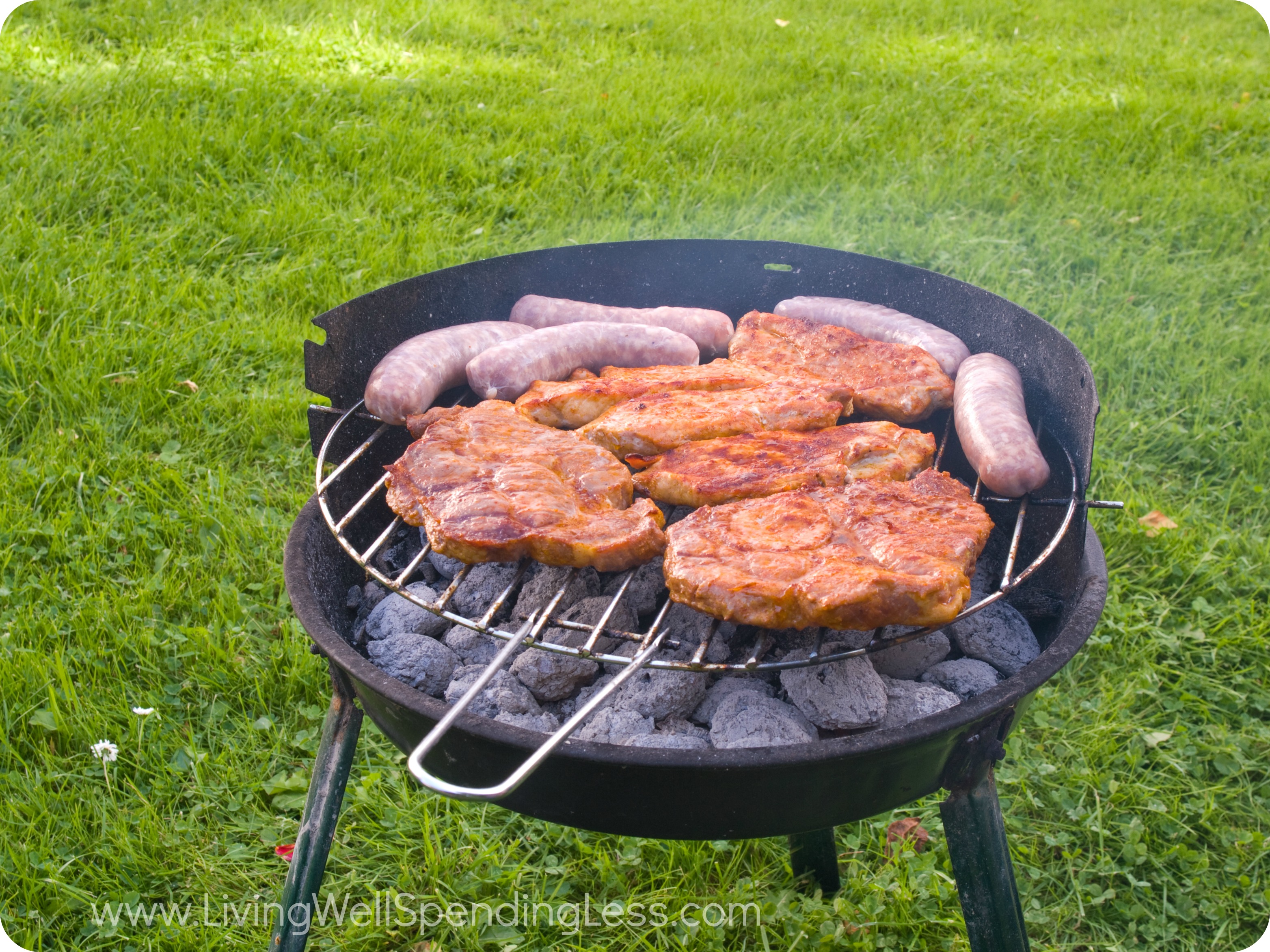 Meat on the grill outside. 