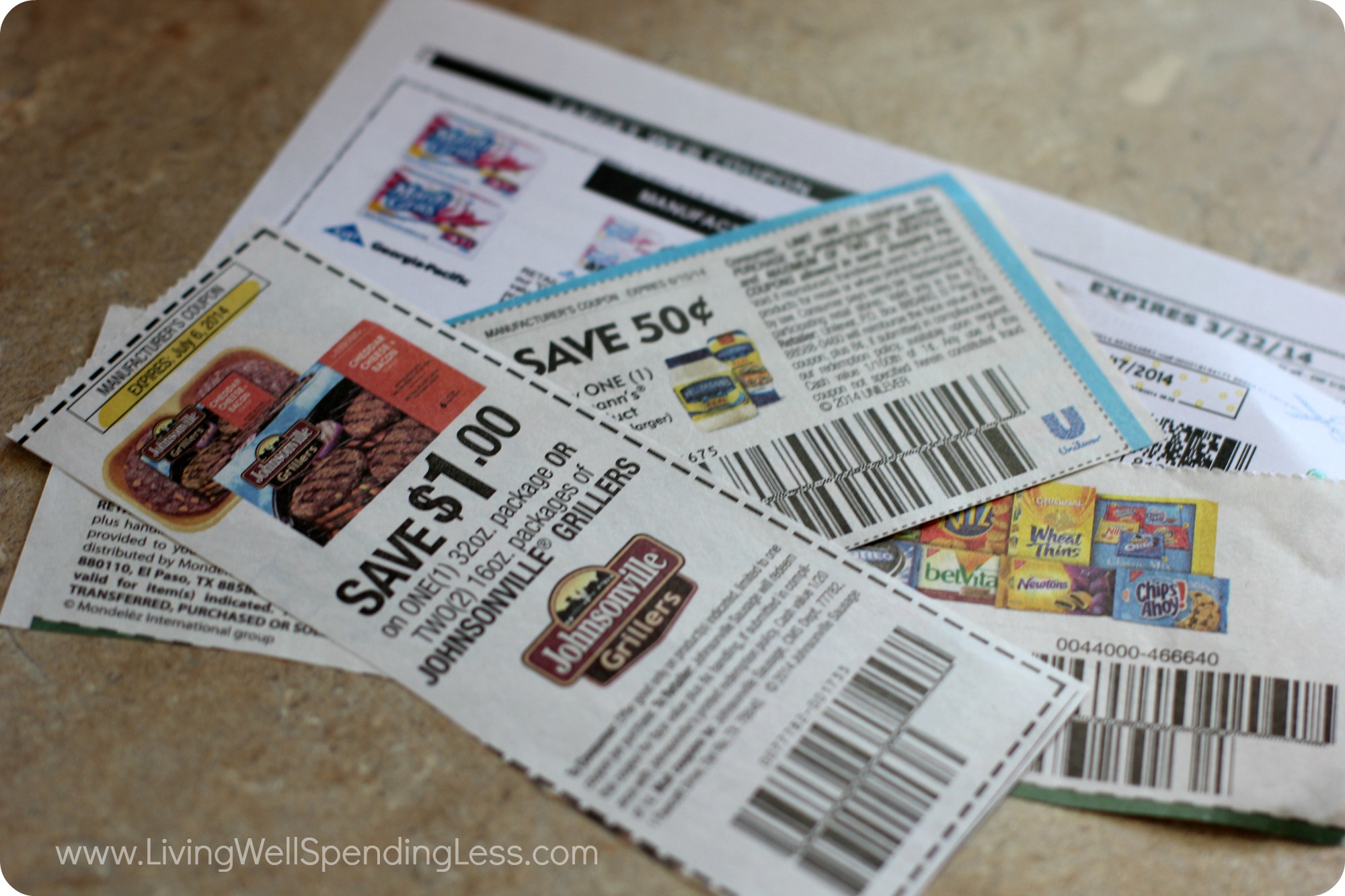 Several different coupons cut up and ready to be used. 