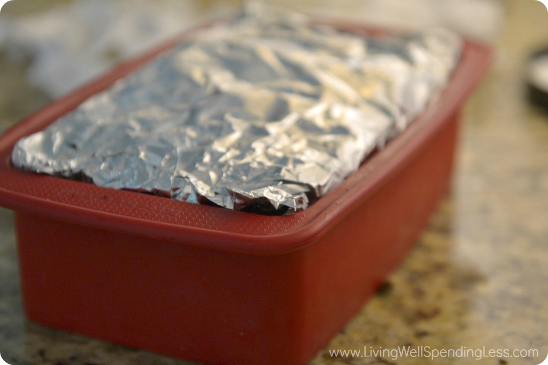 Cover the cake with foil and put it in the freezer to set up.