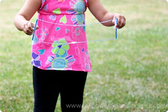 Dip the straw wand into the bubble mixture and begin to play outside. 