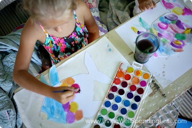 Paint the rainbow fish with various watercolors using any design you'd like. 