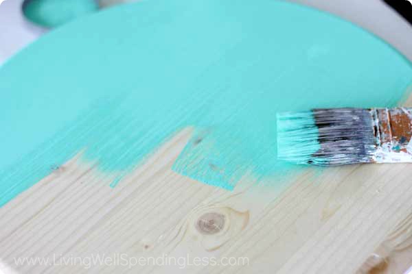 On this DIY tree swing, you can paint the wood seat any color you'd like. This is a great part of the project for your kids to help out with. 