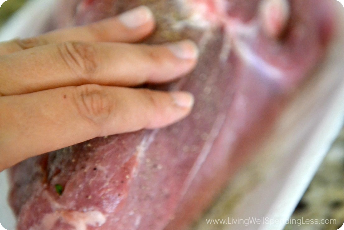 Rub the pork shoulder with salt and pepper before you begin cooking, 
