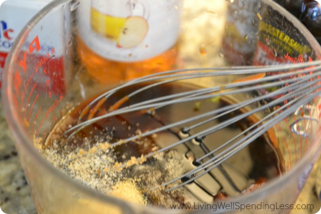 In medium bowl, whisk together ketchup, brown sugar, Worcestershire sauce, vinegar, garlic powder, ground mustard, seasoned salt, and liquid smoke until smooth.