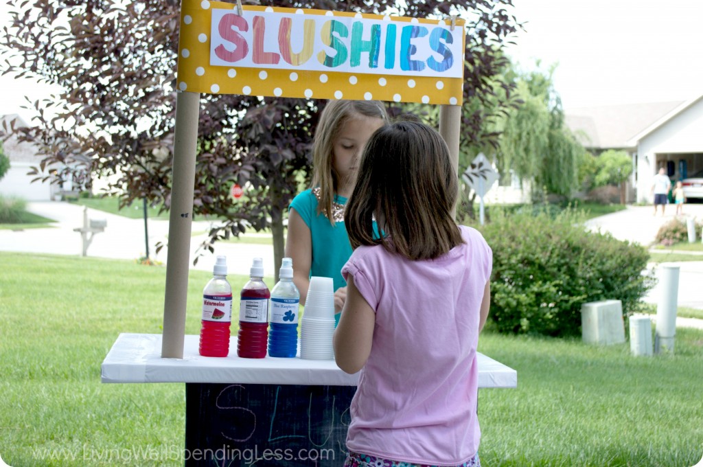 This diy slushie stand is a fun way to keep your kids entertained this summer