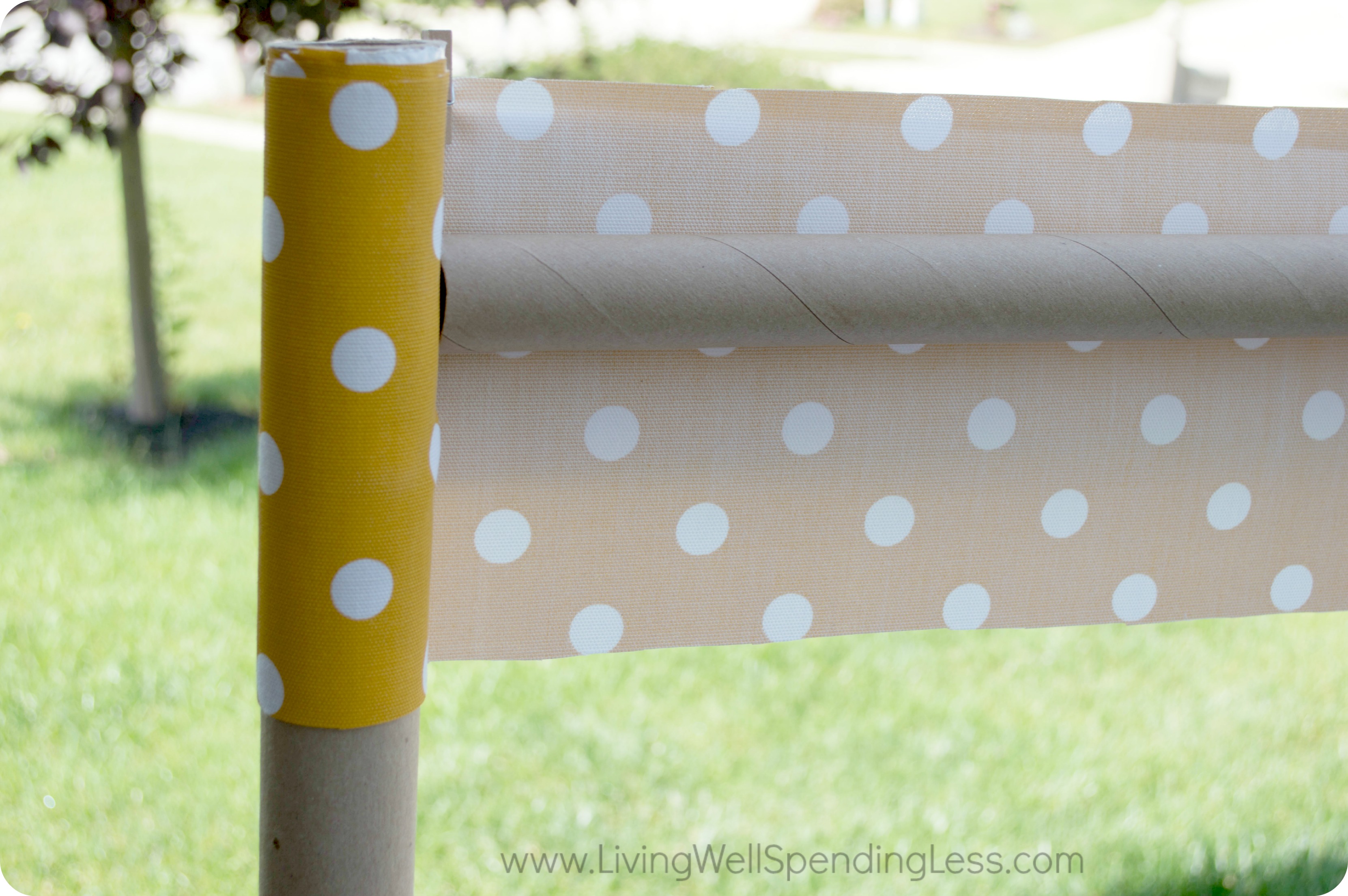 Use the cardboard tubes and fabric for a banner