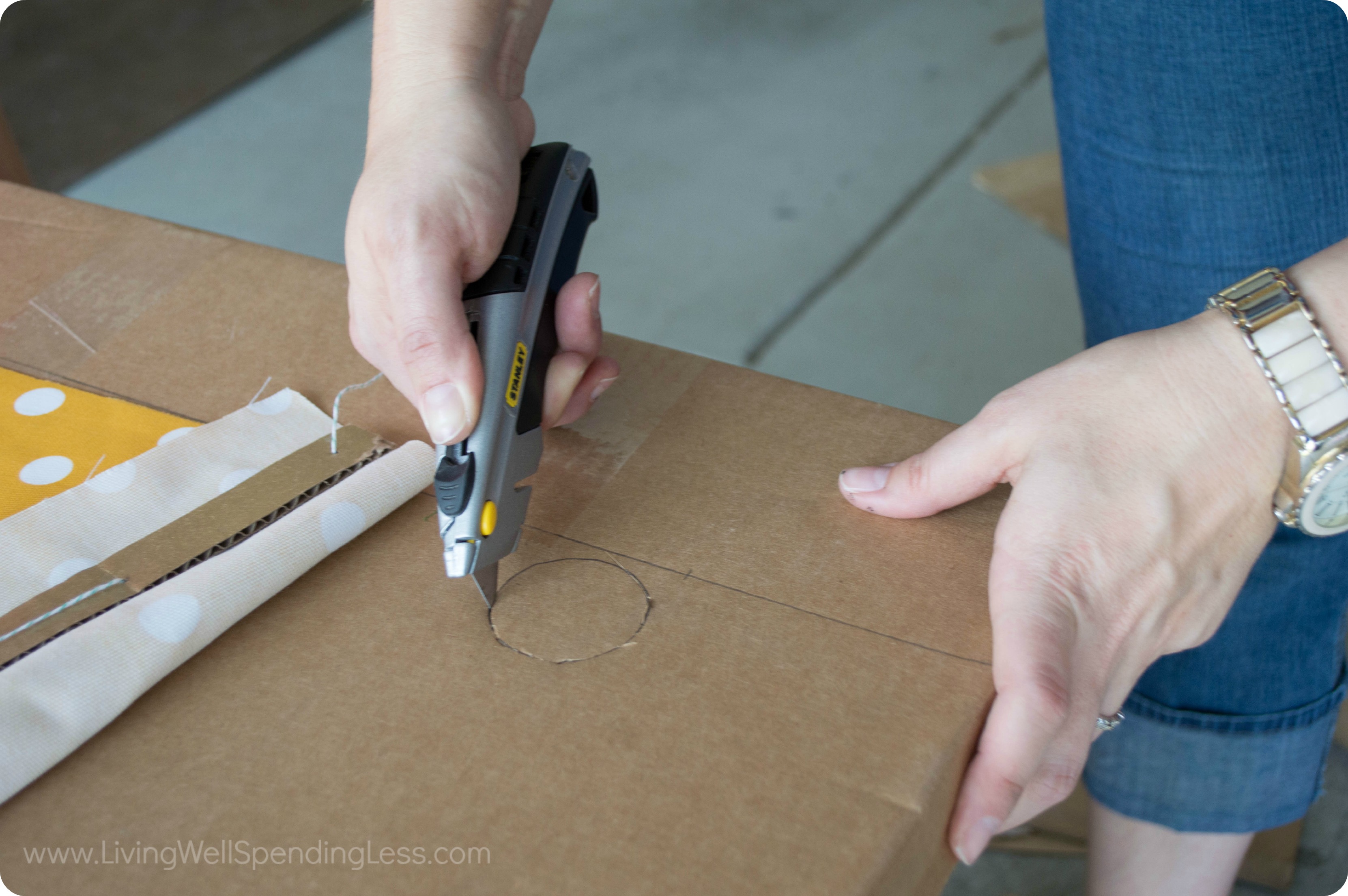 Carefully cut circles in the cardboard counter