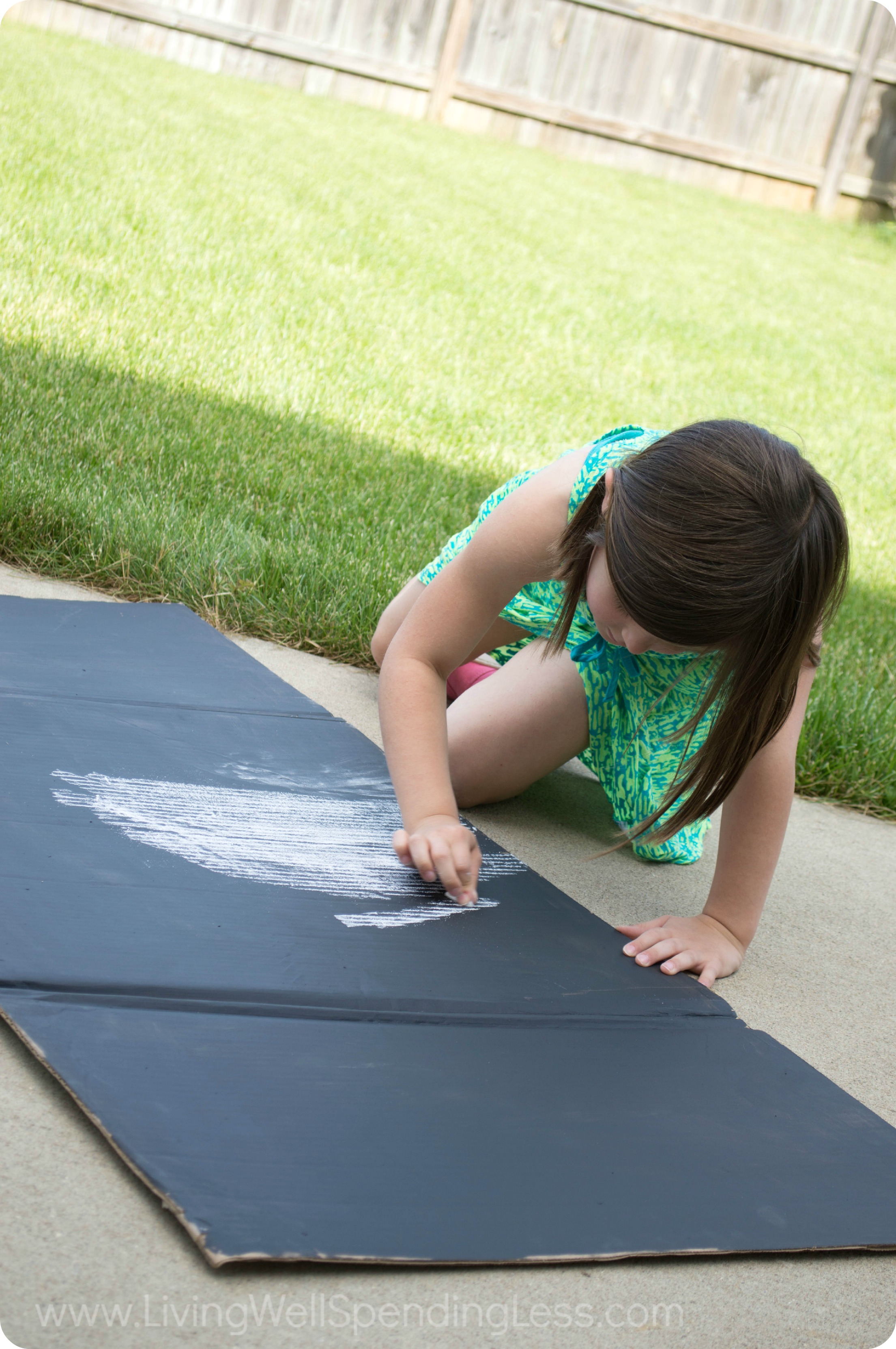 Use chalkboard paint for the cover and let your kids decorate it with chalk